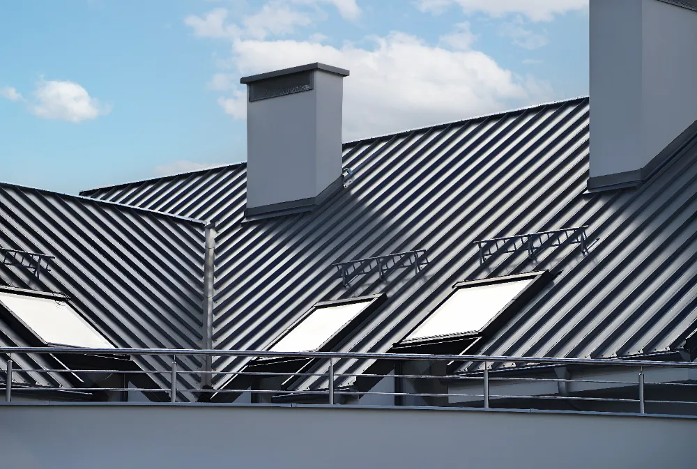 Modern ribbed metal roofing system on a commercial building in Maine, showing clean lines and durable steel construction.