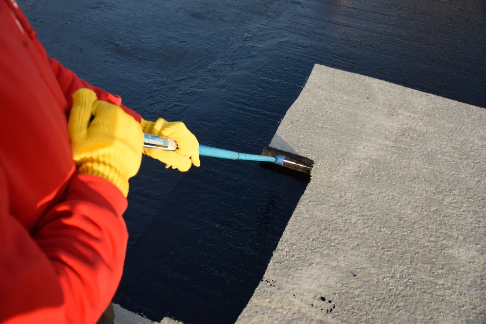 Flat roof rubber coating application in Brewer Maine
