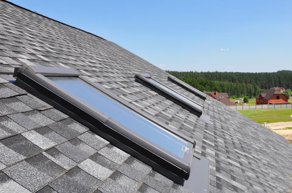 Asphalt shingle roof with skylight in Belfast Maine