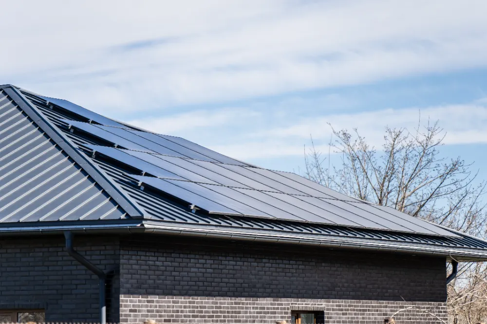 Standing seam roof with solar panels in Camden Maine